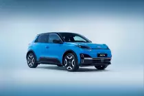 4-view-of-new-micra-in-gear-blue-body-color-black-roof-wheels-signature-headlamps-micra-nissan-nameplate