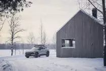 339594-volvo-ex30-cross-country-with-swedish-winter-cabin